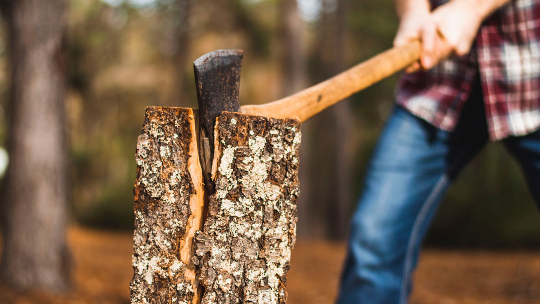 man chopping wood