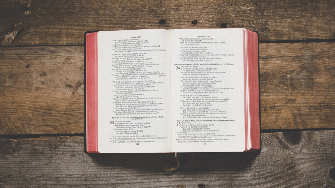 Open Bible on a wooden table