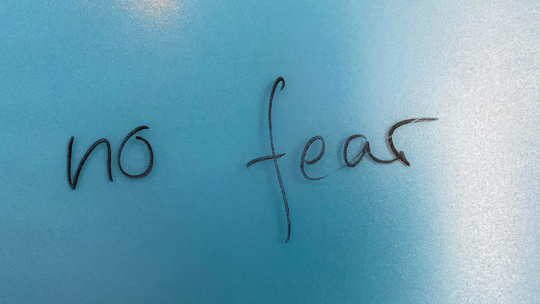 No fear written on blue surface