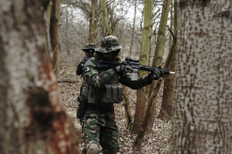 soldier pointing with rifle