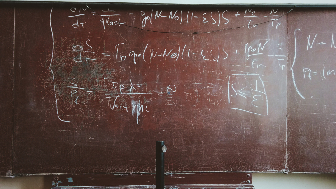 Math equations on chalkboard