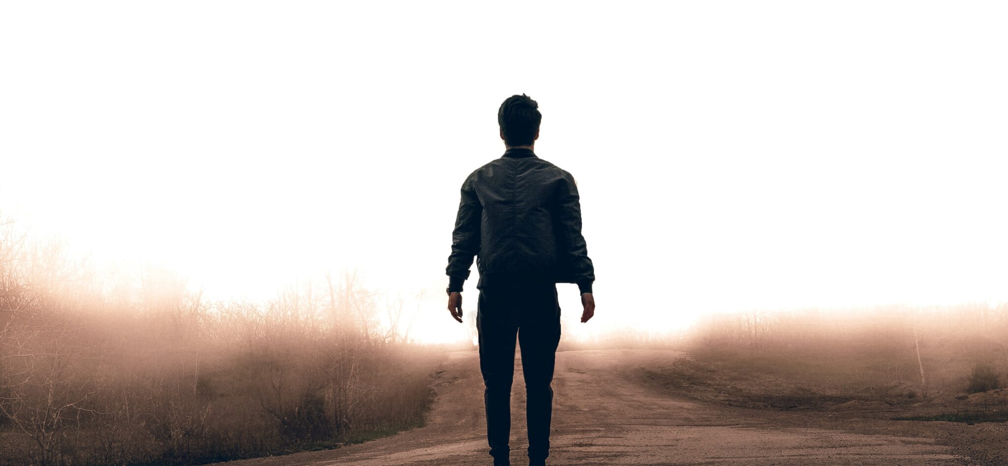 Man walking on a dirt road