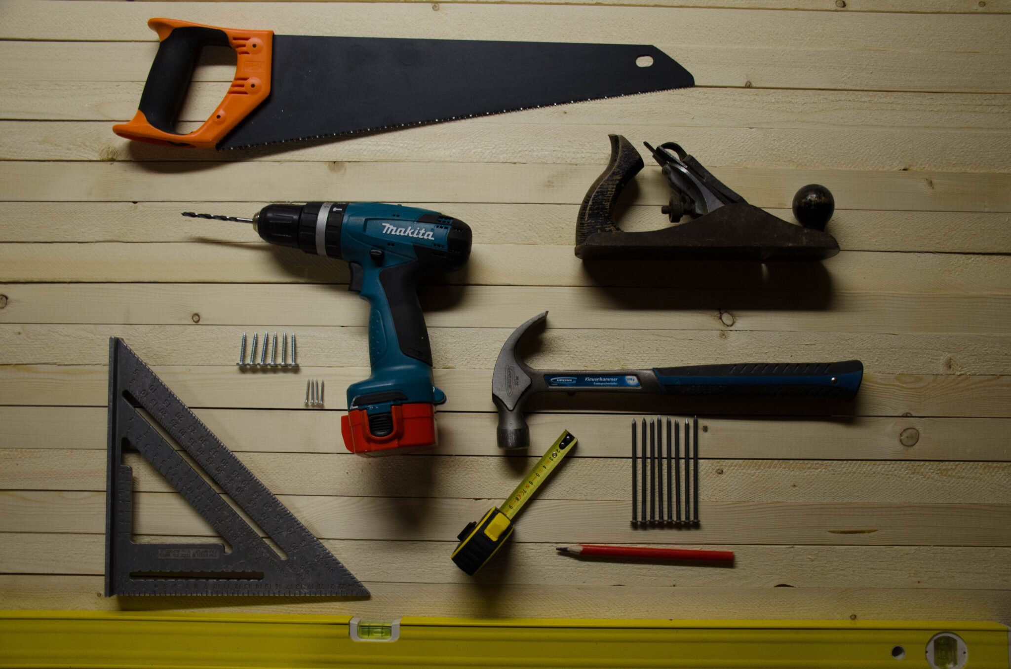 Tools laid out on wooden surface