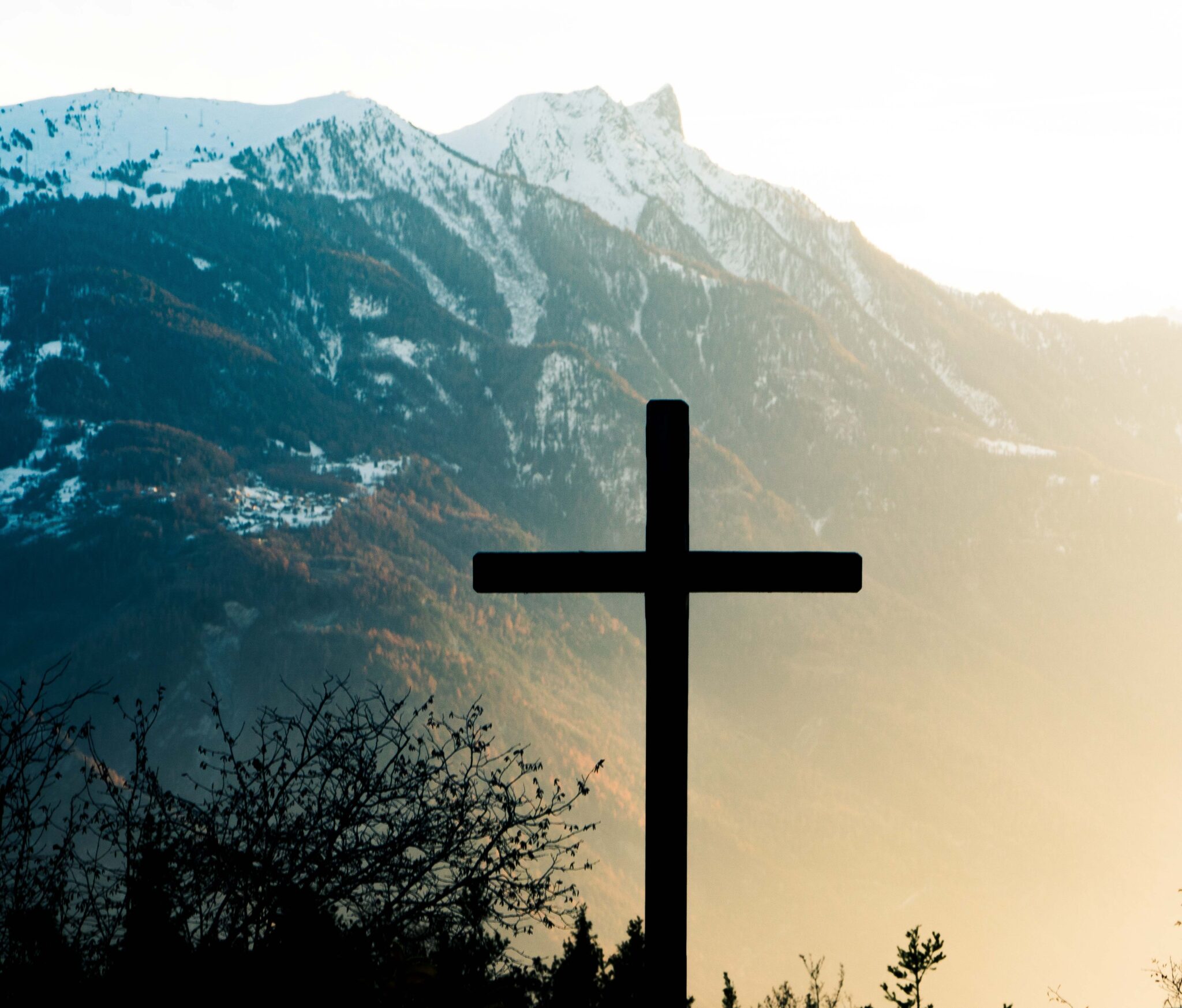 Cross with mountains in the background