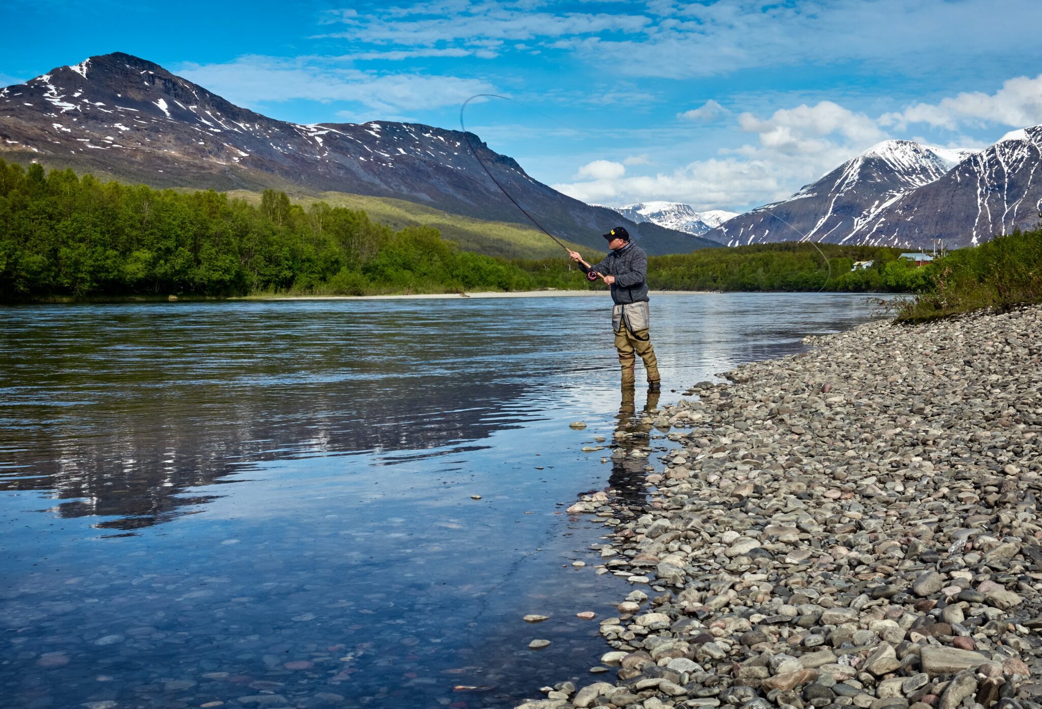 Man fishing on a river