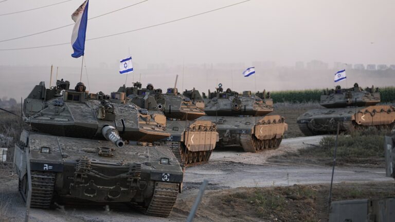 Convoy of tanks with Israel flags